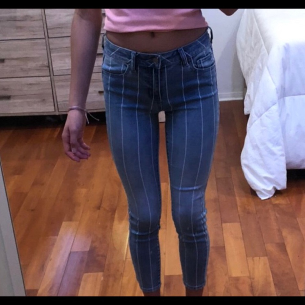 blue light jeans with white strips